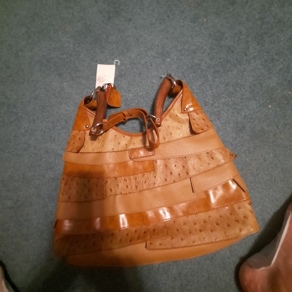 Tan leather purse shipped with ostrich